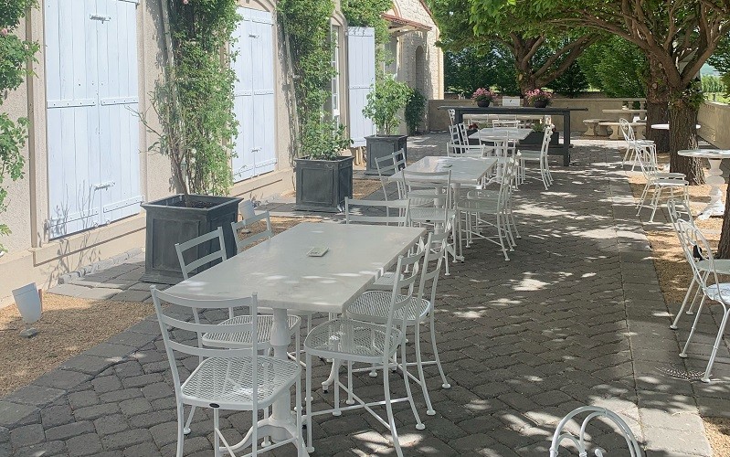 Hedges Family Estate Winery with our custom wrought iron chairs and table bases powdercoated in white.