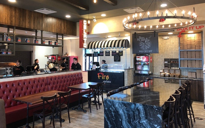 Firo Pizza in Georgetown's charming interior accented with our Cortona chairs and stools and custom booths